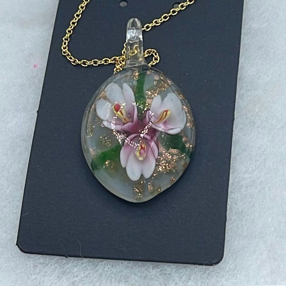 Floral art glass pendant on a 925 plated gold chain.